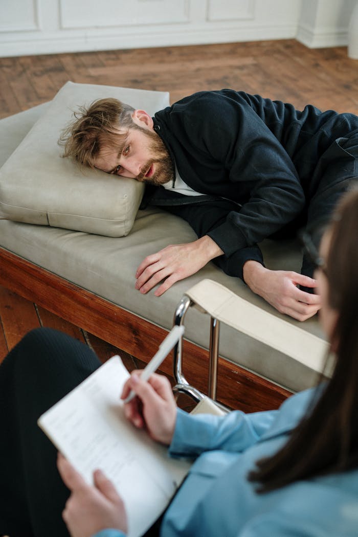 Therapist and patient during a counseling session focusing on mental health.